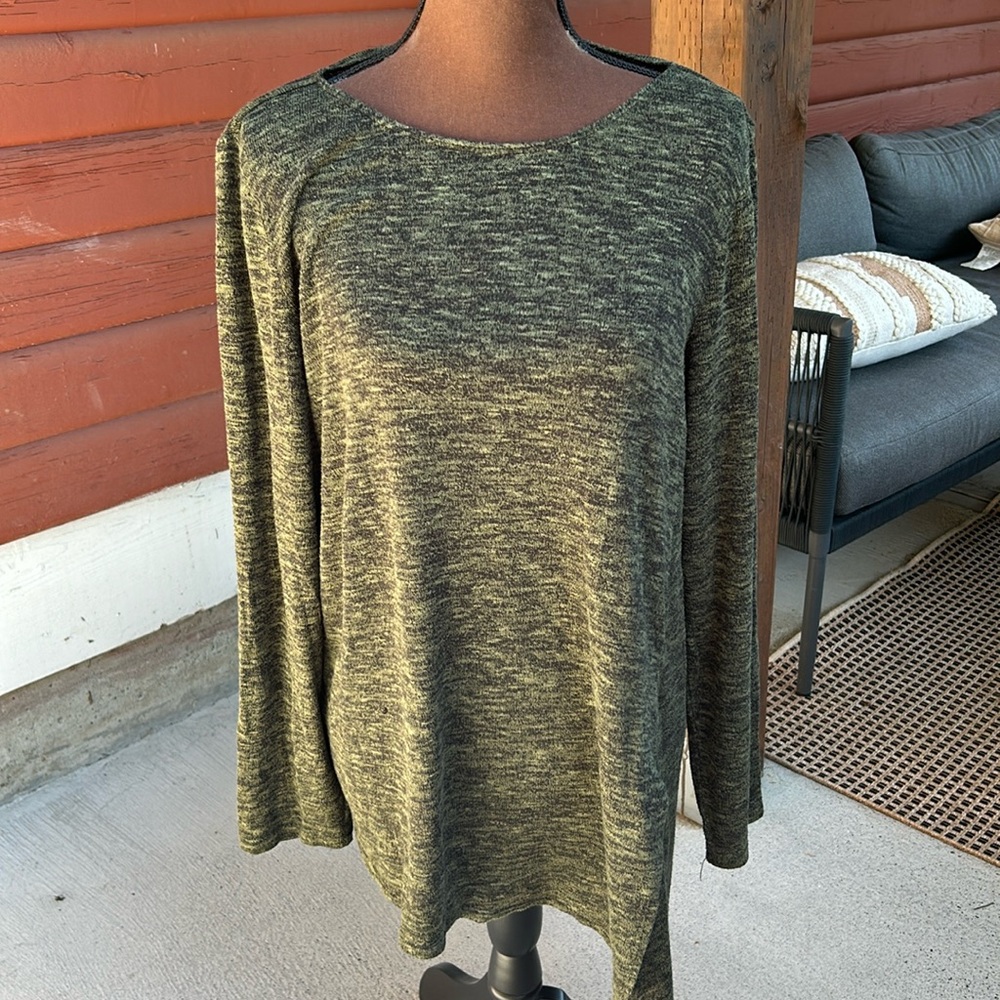 Sweater with angled hem